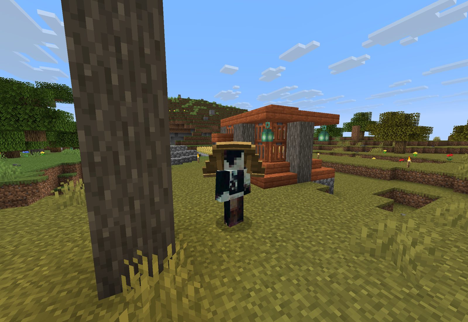 Custom Nucifera blocks on a grassy hillside: opal ore, a trading portal and mossy logs